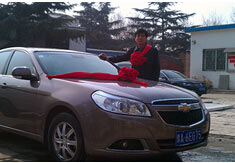 超前涂料獎勵員工轎車，真石漆生產(chǎn)廠家！